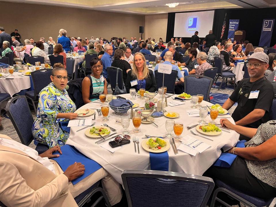 Goodwill Industries of Central Florida reception honors over 200 employees with guest speakers and a caricature artist.