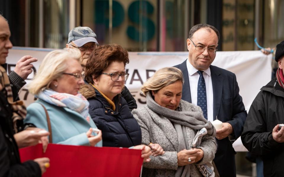 Protesters outside the Financial Conduct Authority for Business meet with the FCA's then CEO Andrew Bailey to make complaints about being victims of bank fraud on 6th December 2019 - Julian Andrews