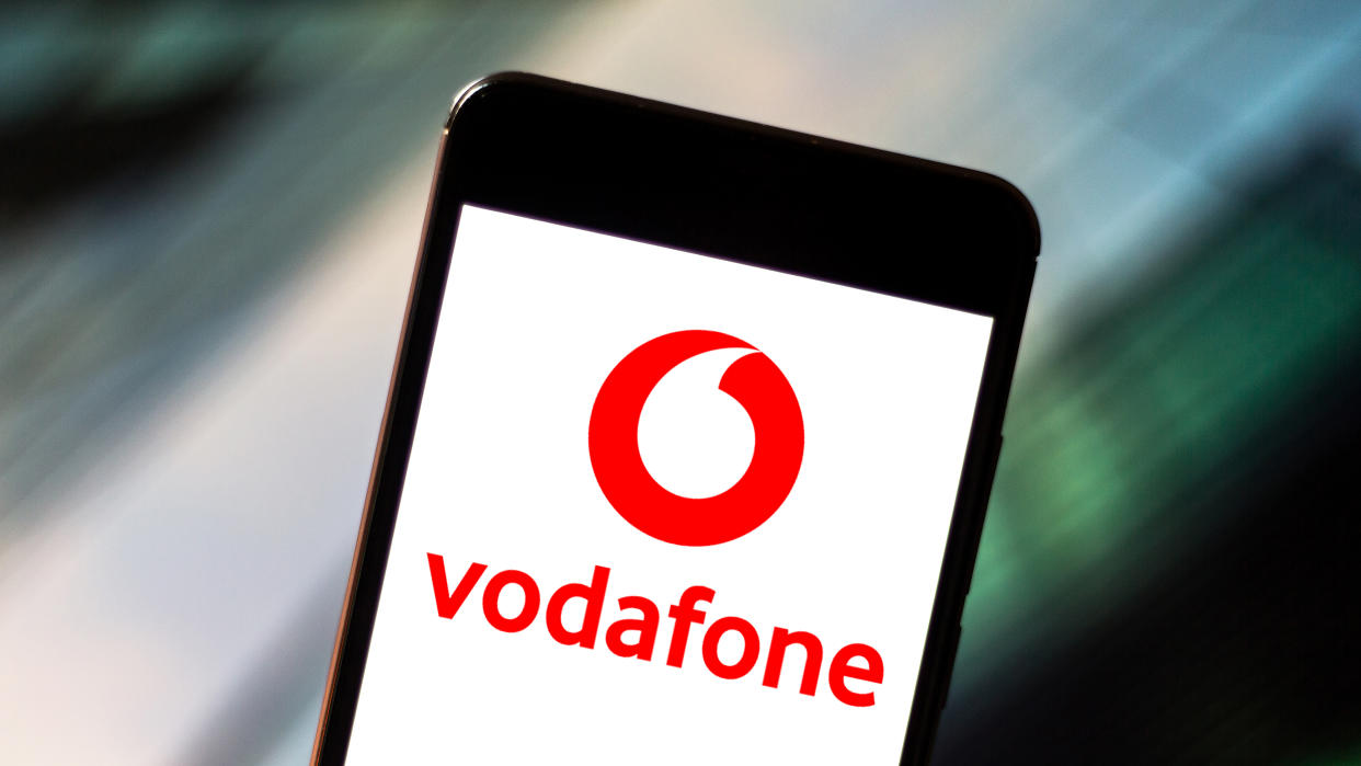  A mobile phone showing the Vodafone logo 