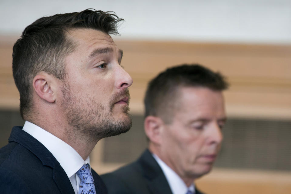 Reality TV star Chris Soules, of "The Bachelor," left, sits in the courtroom for his sentencing on leaving-the-scene charges, Tuesday, May 21, 2019, in Independence, Iowa. (Kelly Wenzel/The Courier via AP, Pool)