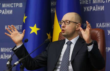 Ukrainian Prime Minister Arseny Yatseniuk attends a news conference in Kiev, November 20, 2014. REUTERS/Valentyn Ogirenko