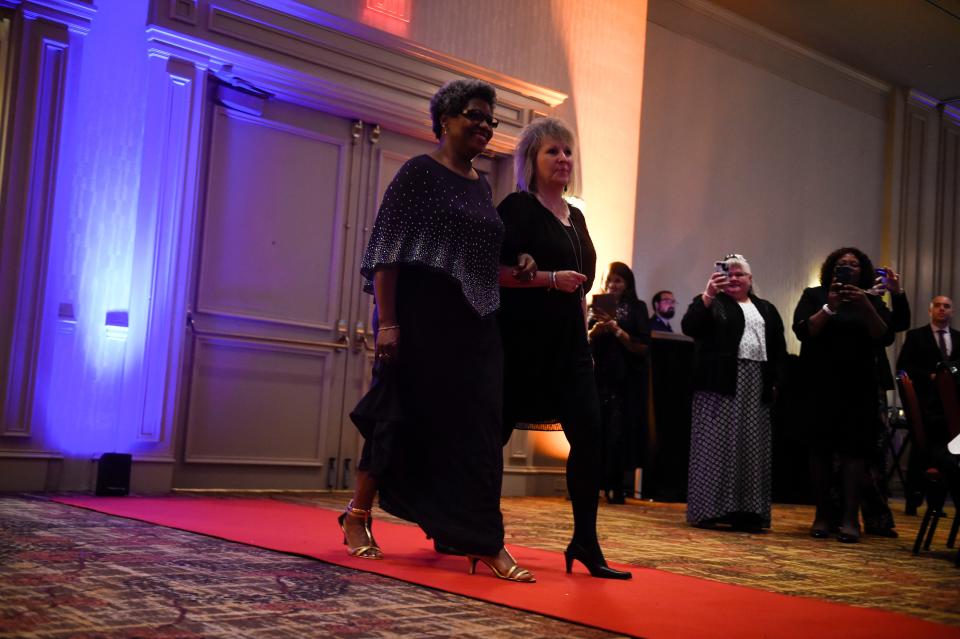 Vanessa Patten walks the red carpet during Richmond County's Teacher of the Year awards at the Augusta Marriott on Thursday, Oct. 6, 2022. Patten is a first-grade teacher at Warren Road Elementary School.