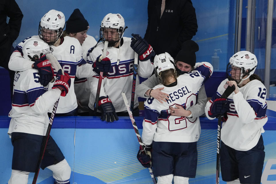 United States reacts after losing to Canada in the women's gold medal hockey game at the 2022 Winter Olympics, Thursday, Feb. 17, 2022, in Beijing. (AP Photo/Jae C. Hong)