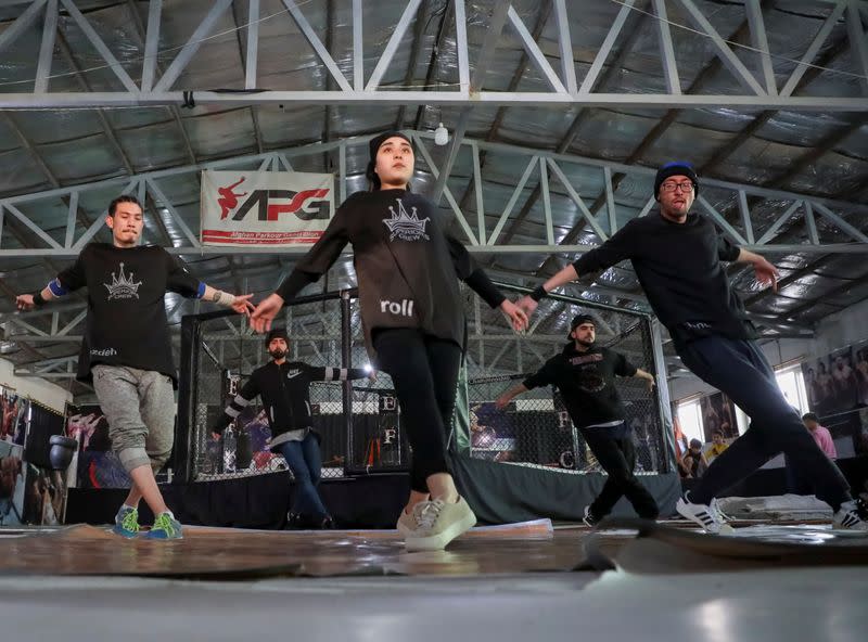 Afghan youth practise breakdancing during a training session in Kabul