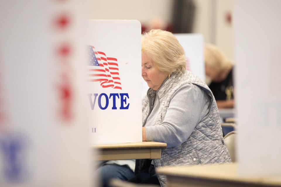 A voter fills out their ballot at Bedford High School during the New Hampshire Primary on September 13, 2022 in Bedford, New Hampshire. (Scott Eisen/Getty Images)