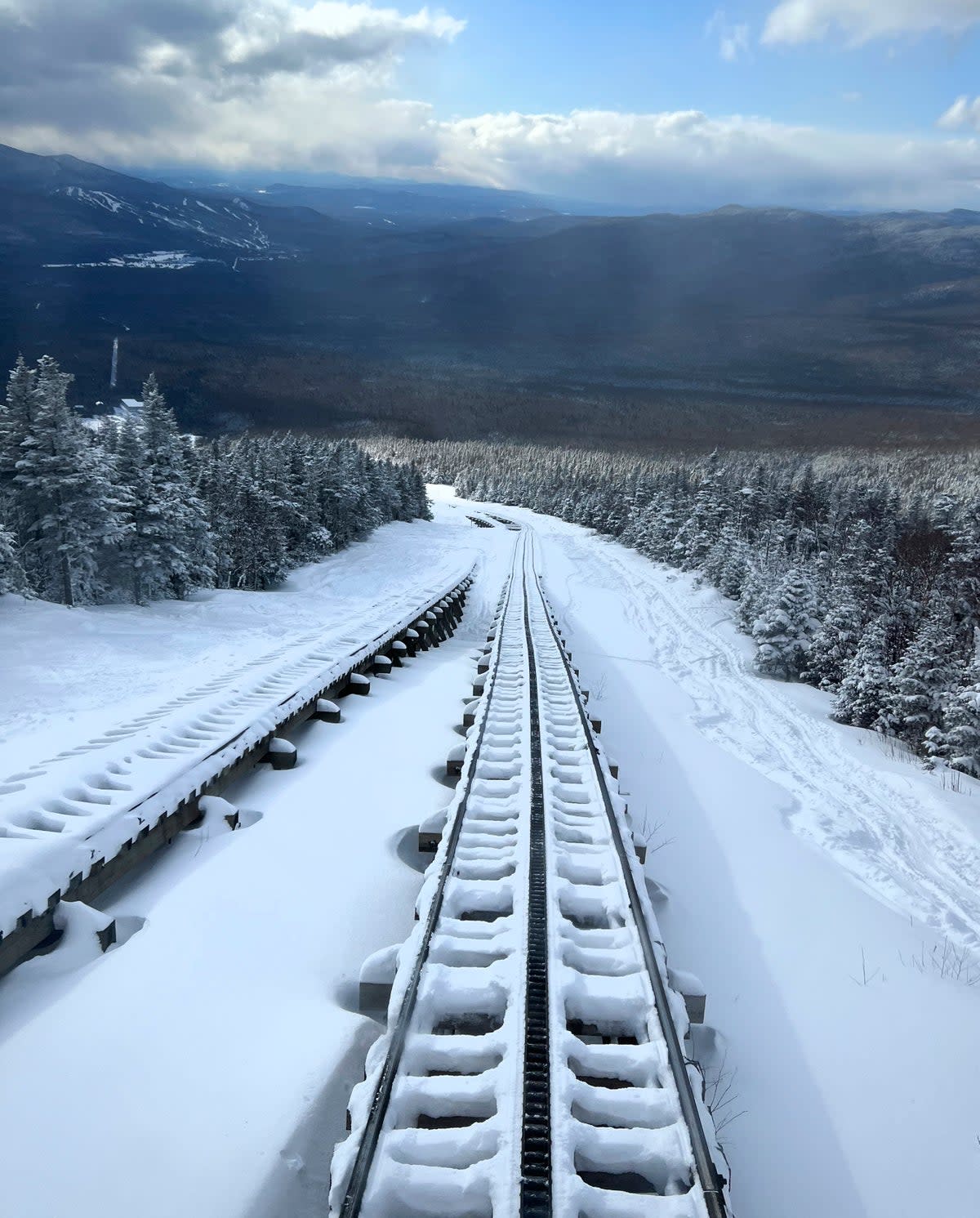 Conditions were harsh, and the hiker sustained hypothermia and his clothes were frozen (Conservation Officer Brad Jones/New Hampshire Fish and Game via AP)