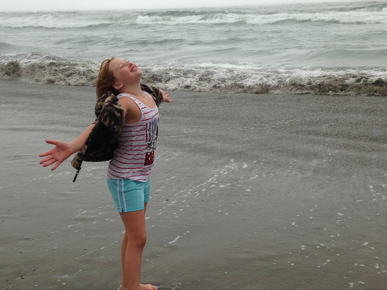 Granddaughter Jessica, reveling on her first trip to the California coast.