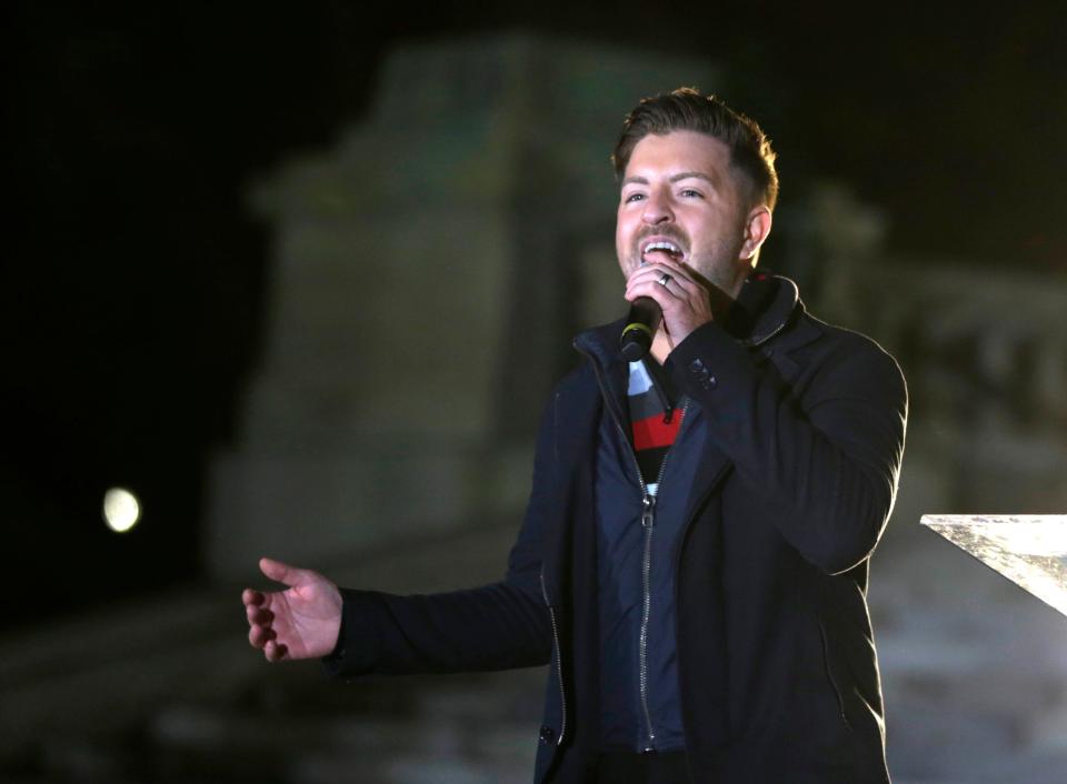 RI singer Billy Gilman serenades with seasonal songs during the annual State House Holiday Celebration and Tree Lighting on Dec 2, 2021.