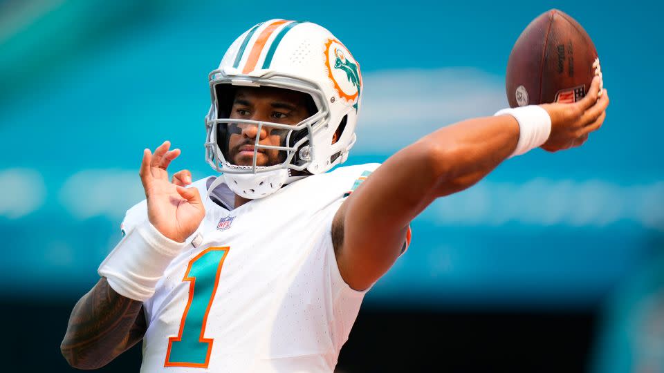 Tua Tagovailoa, the NFL's only left-handed starting quarterback, spearheads the Dolphins offense. - Rich Storry/Getty Images