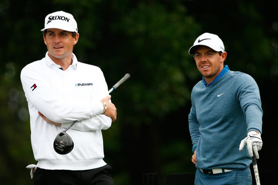 Rory McIlroy (right) believes that it would be impossible for Keegan Bradley to both captain and play at the Ryder Cup  (Getty Images)