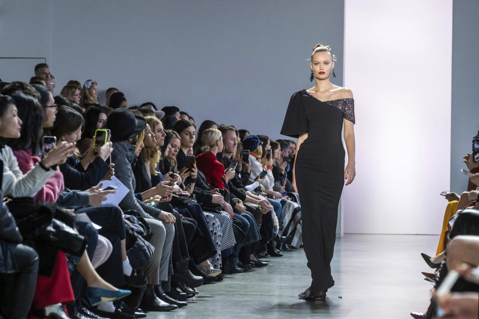 The Badgley Mischka collection is modeled at Spring Studios during NYFW Fall/Winter 2020 on Saturday, Feb. 8, 2020, in New York. (Photo by Charles Sykes/Invision/AP)