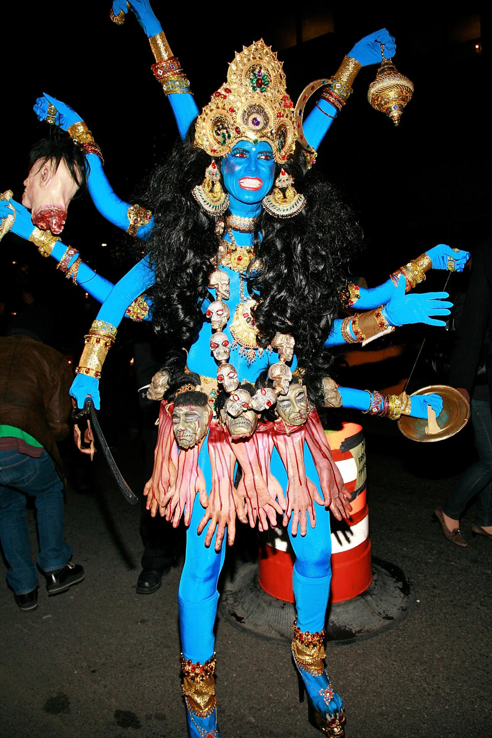 <p>In 2008, the so-called Queen of Halloween courted controversy by dressing as Kali, the Hindu goddess of destruction. Her portrait of the deity with the vampire fangs and a skirt made of severed bloody hands upset Hindu leaders. (Photo: Charles Eshelman/Getty Images) </p>