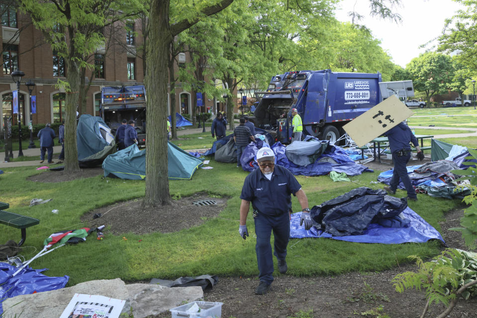Chicago police have closed off the campus quad after dismantling a pro-Palestinian encampment at DePaul University in Chicago, Thursday, May 16, 2024. The encampment was taken down in the early morning, hours after the school's president told students to leave the area or face arrest. Students at many college campuses this spring set up similar encampments, calling for their schools to cut ties with Israel and businesses that support it, to protest Israel's actions in the war with Hamas. (AP Photo/Teresa Crawford)