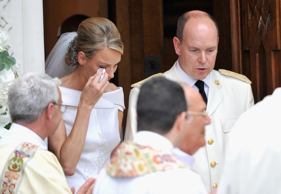 Princess Charlene wipes away a tear on wedding day to Prince Albert II of Monaco (Getty Images)