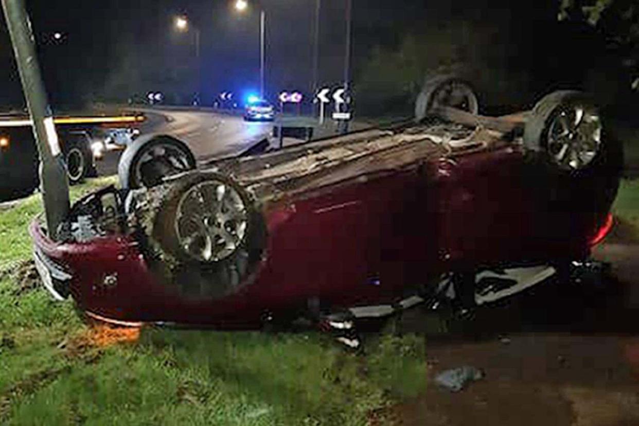 Undated handout photo issued by Cambridgeshire Police of Alex Hobbs' flipped Ford Fiesta in David's Lane, Werrington: PA