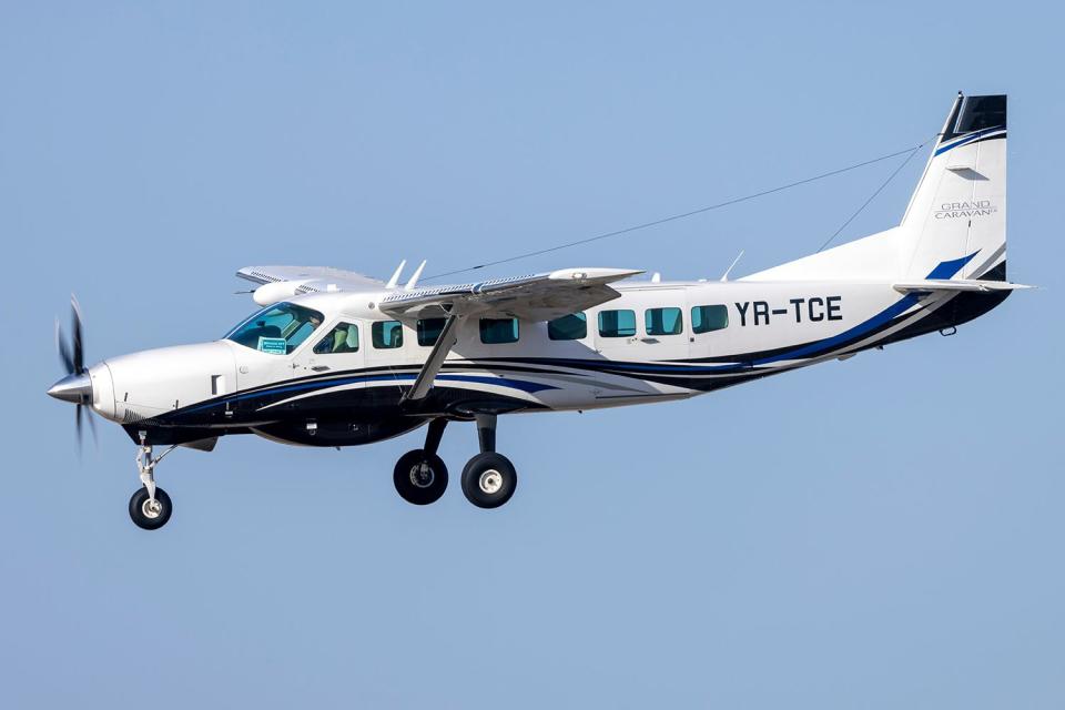 <p>InsectWorld/Shutterstock</p> A stock photo of a Private Cessna 208B Grand Caravan aircraft