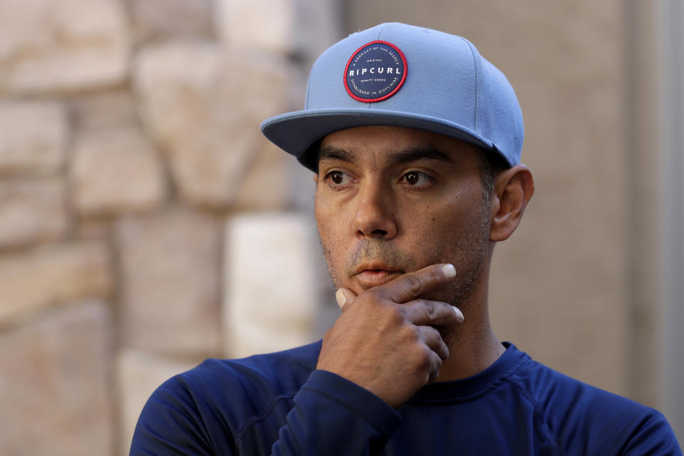 Aaron Staddon, a relative of some of the members of a Mormon community who were attacked while traveling near the US-Mexico border, speaks from his home, Tuesday, Nov. 5, 2019, in Queen Creek, Ariz. Drug cartel gunmen ambushed three vehicles along a road near the state border of Chihuahua and Sonora on Monday, slaughtering at least six children and three women from the extended LeBaron family, all of them U.S. citizens living in northern Mexico, authorities said Tuesday. (AP Photo/Matt York)