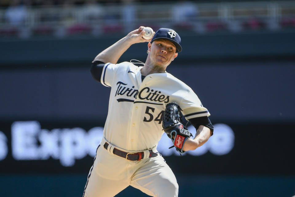 Minnesota Twins pitcher Sonny Gray throws against the Cleveland Guardians during the first inning of a baseball game Wednesday, Aug. 30, 2023, in Minneapolis. (AP Photo/Craig Lassig)