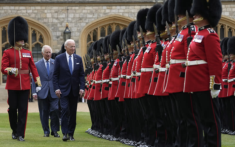 President Biden reviews royal guards along with Britain's King Charles III