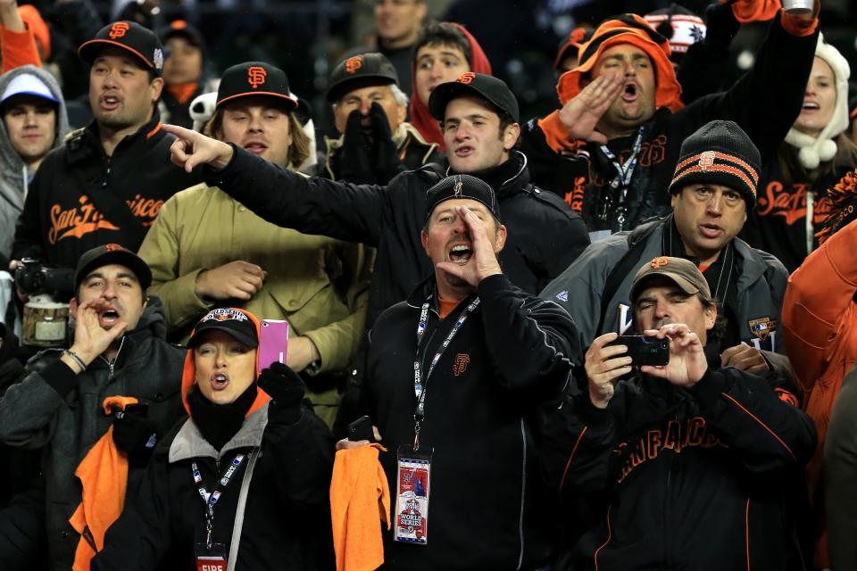 The San Francisco Giants fans cheer after defeating the Detroit Tigers in the tenth inning to win Game Four of the Major League Baseball World Series at Comerica Park on October 28, 2012 in Detroit, Michigan. The San Francisco Giants defeated the Detroit Tigers 4-3 in the tenth inning to win the World Series in 4 straight games. (Photo by Doug Pensinger/Getty Images)