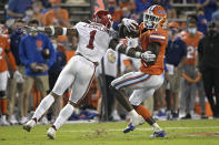 Florida wide receiver Kadarius Toney, right, breaks free after catching a pass in front of Arkansas defensive back Jalen Catalon during the first half of an NCAA college football game Saturday, Nov. 14, 2020, in Gainesville, Fla. (AP Photo/Phelan M. Ebenhack)
