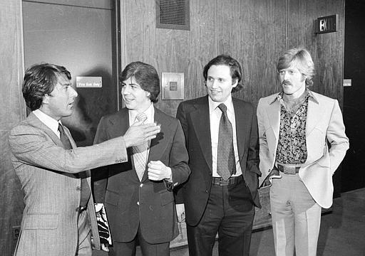 Washington Post reporters Carl Bernstein, second from left, and Bob Woodward, third from left, are flanked by actors Dustin Hoffman and Robert Redford as they attend the premiere of the motion picture "All the President's Men," in Washington, D.C., on April 5, 1976. The film is based on the two reporters' book documenting their investigation of the Watergate Scandal. (AP Photo)
