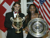 LONDON - JULY 6: (FILE PHOTO) Wimbledon Champions Roger Federer of Switzerland and Serena Williams of the U.S. pose for photographs prior to attending the Wimbledon Ball at the Savoy Hotel on July 6, 2003 in London. (Photo by Alex Livesey/Getty Images) Celebrating 125 Years Of Wimbledon Please refer to the following profile on Getty Images Archival for further imagery. http://www.gettyimages.co.uk/Search/Search.aspx?EventId=115973863&EditorialProduct=Archival Fashions http://www.gettyimages.co.uk/Search/Search.aspx?EventId=115973067&EditorialProduct=Archival For further imagery also see this lightbox http://www.gettyimages.co.uk/Account/MediaBin/LightboxDetail.aspx?Id=19295855&MediaBinUserId=3936288