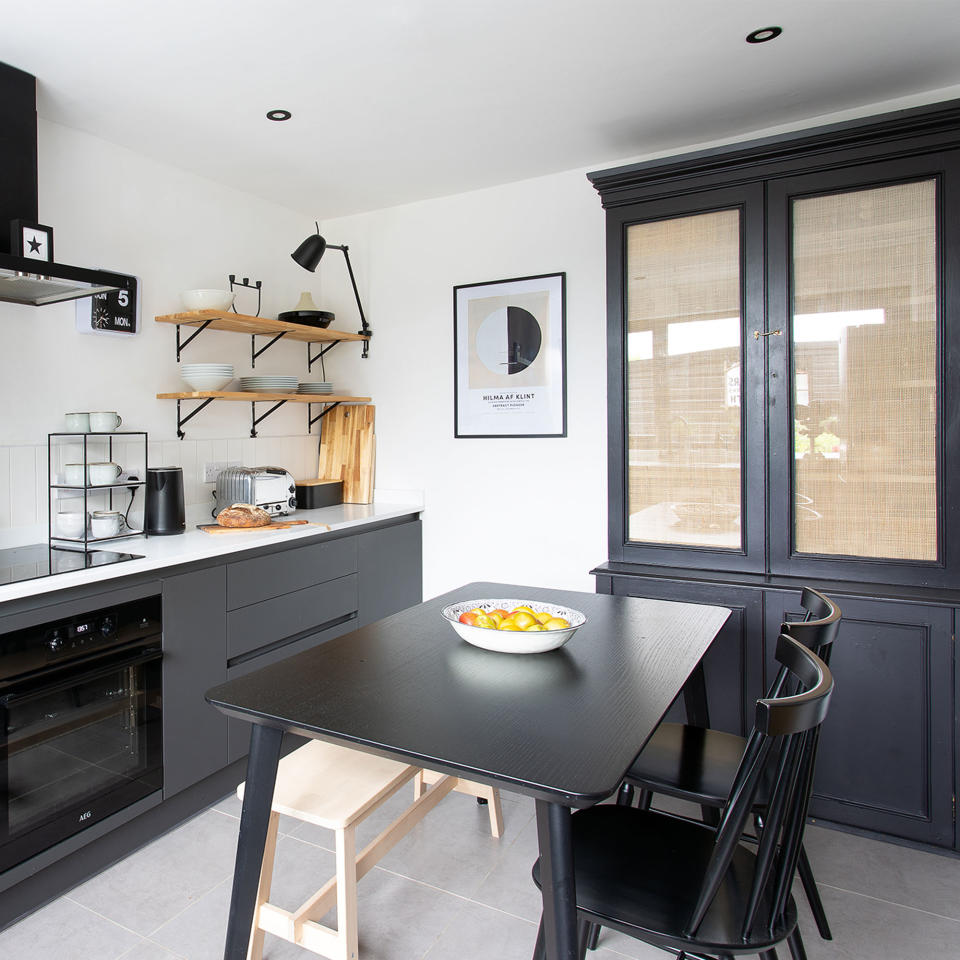 black and white kitchen with dresser