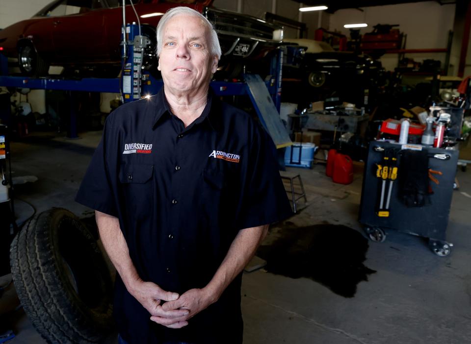 Retired GM executive Mike Copeland at his Arrington Performance shop in Brighton on Wednesday, May 8, 2024. Inside the shop, Copeland and others develop hot rods that are fueled by hydrogen, including this 1948 Chevy 3100 pickup truck that gets 250 miles on one tank of hydrogen.