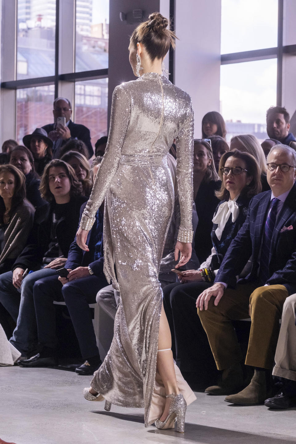 The Badgley Mischka collection is modeled at Spring Studios during NYFW Fall/Winter 2020 on Saturday, Feb. 8, 2020, in New York. (Photo by Charles Sykes/Invision/AP)