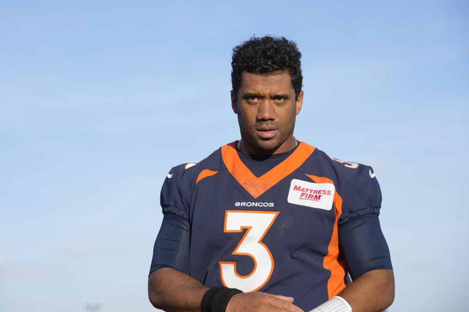 Denver Broncos quarterback Russell Wilson attends a news conference after a practice session in Harrow, England, Wednesday, Oct. 26, 2022 ahead the NFL game against Jacksonville Jaguars at the Wembley stadium on Sunday. (AP Photo/Kin Cheung)