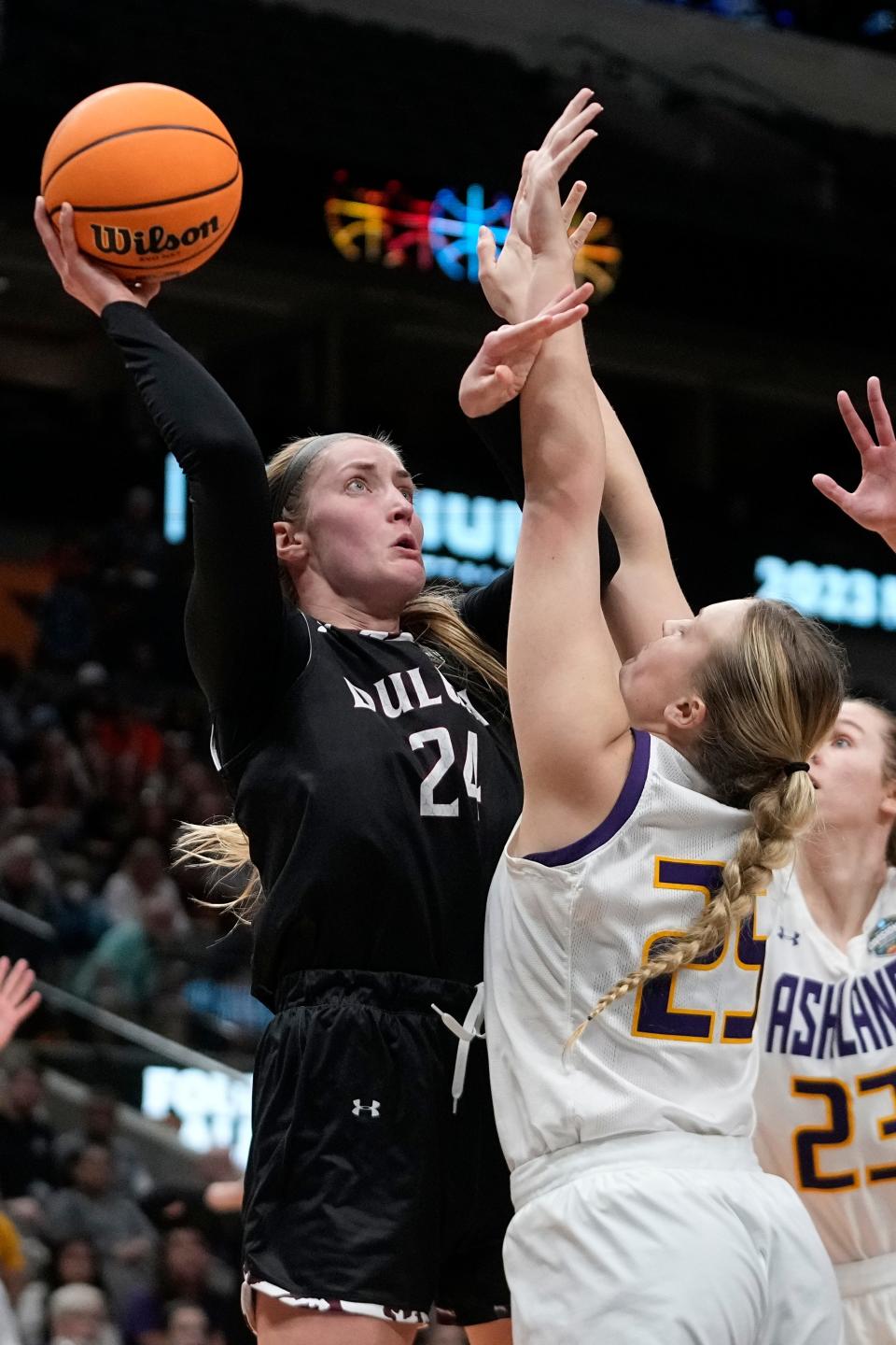 Minnesota Duluth's Brooke Olson shoots past Ashland's Zoe Miller during the first half of an NCAA Women's Division 2 championship basketball game Saturday, April 1, 2023, in Dallas. (AP Photo/Darron Cummings)