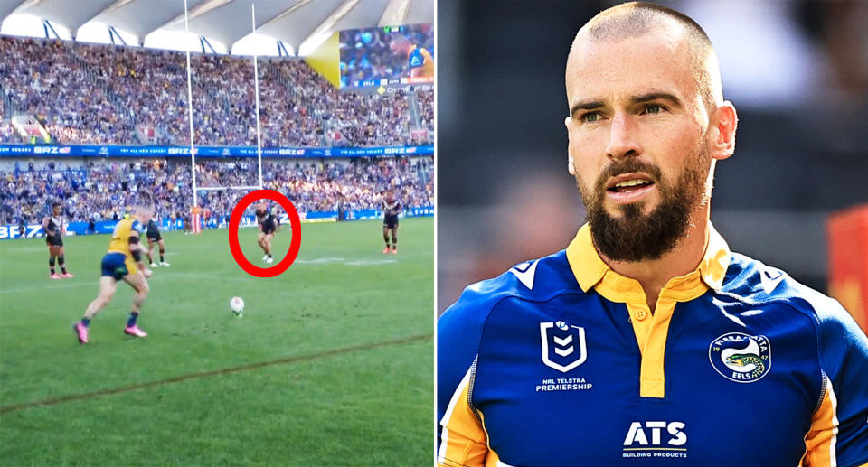 Pictured left is Tigers forward David Klemmer distracting Eels captain Clint Gutherson on a penalty kick.