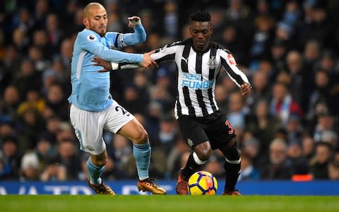  David Silva of Manchester City and Christian Atsu of Newcastle - Credit: GETTY IMAGES