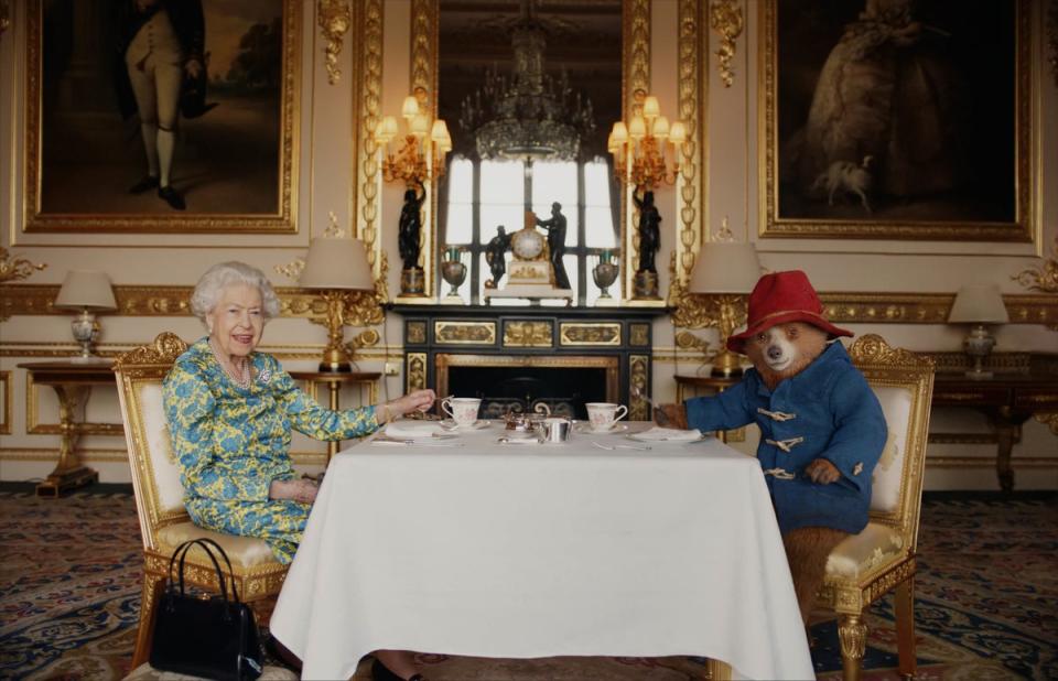 Paddington and Queen Elizabeth II in a scene shown at the Jubilee celebrations in 2022 (PA)