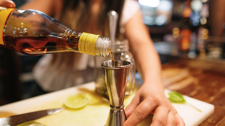 Bartender making a mojito cocktail