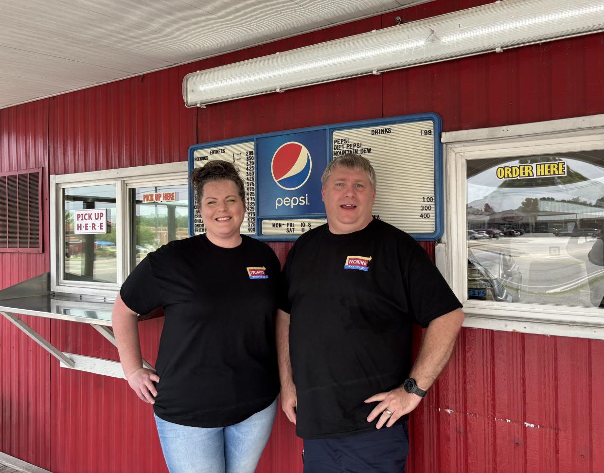 Beth Dowless (right) took over the Frontier Food to Go restaurant from her grandfather, and founder, Elbert Bradshaw. She's now passing the legacy on to a new owner, Todd Champion (left).