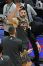 Chicago Bulls center Nikola Vucevic (9) celebrates with teammates after the Bulls defeated the Cleveland Cavaliers in an NBA basketball game in Chicago, Saturday, April 17, 2021. (AP Photo/Nam Y. Huh)