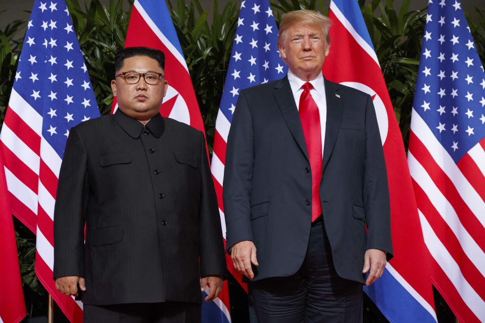 FILE - U.S. President Donald Trump, right, meets with North Korean leader Kim Jong Un on Sentosa Island, in Singapore on June 12, 2018. After winning a bitterly contested presidential election, South Korean conservative Yoon Suk Yeol will enter office facing a quickly growing North Korean nuclear threat - and with few easy choices ahead to deal with it. (AP Photo/Evan Vucci, File)