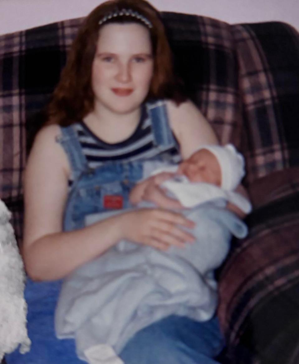 Amy Nochebuena celebrates her first Mother's Day with her first-born child Tristan Bustos in May of 1999. Bustos was 8 days old when the photo was taken.