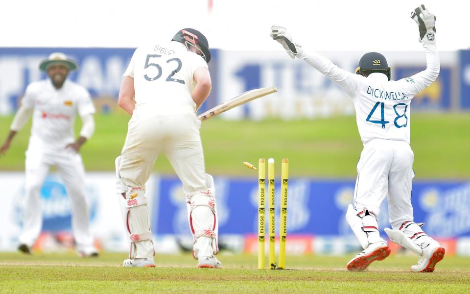 Sri Lanka V Engalnd England Dom Sibley is cleaned up by Lasith Ambuldeniya - ECB