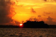 The sun begins its descent behind Grub Island. Photo: Siddharth Dasgupta