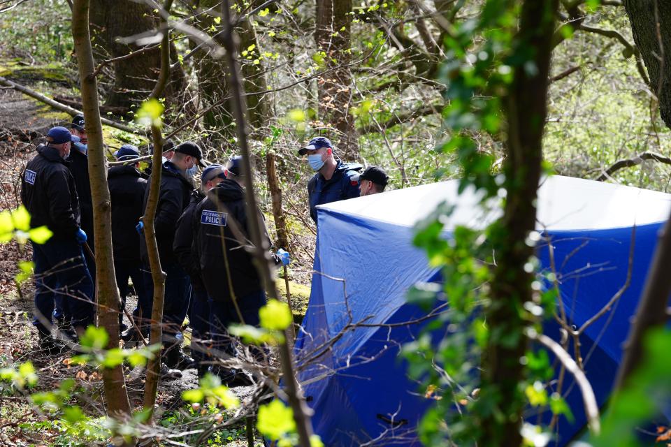 Police officers by a forensic tent at Kersal Dale, near Salford, Greater Manchester, where a major investigation has been launched after human remains were found on Thursday evening. Greater Manchester Police (GMP) said officers were called by a member of the public who found an 