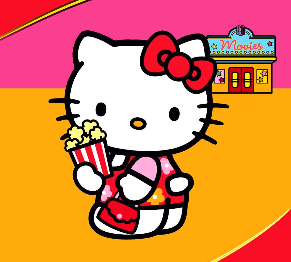 hello kitty holding popcorn