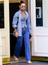 <p>Bella Hadid wears all denim and a flannel face mask as she heads out in N.Y.C. on Thursday.</p>