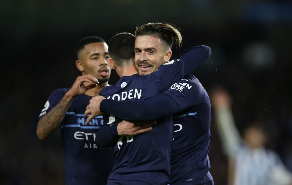 Foden is congratulated by midfield teammate Jack Grealish  (Getty)