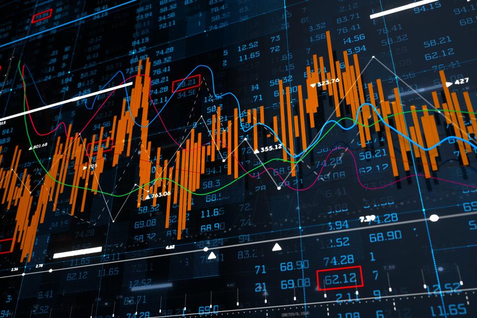 Digital generated image of financial line charts falling down because of coronavirus COVID-19 on blue background.