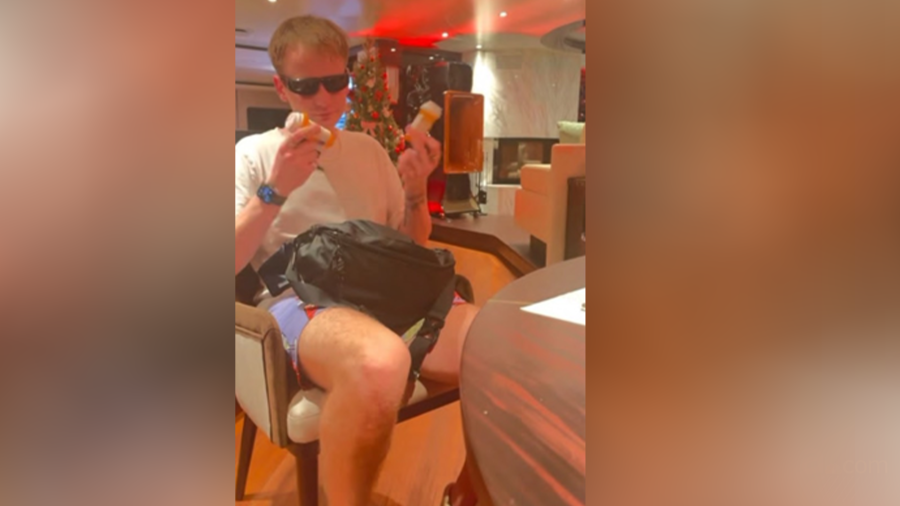 Photo of Brendan Paul holding pill bottles while on Sean “Diddy” Combs’ yacht. The photo is included in a lawsuit against Diddy.