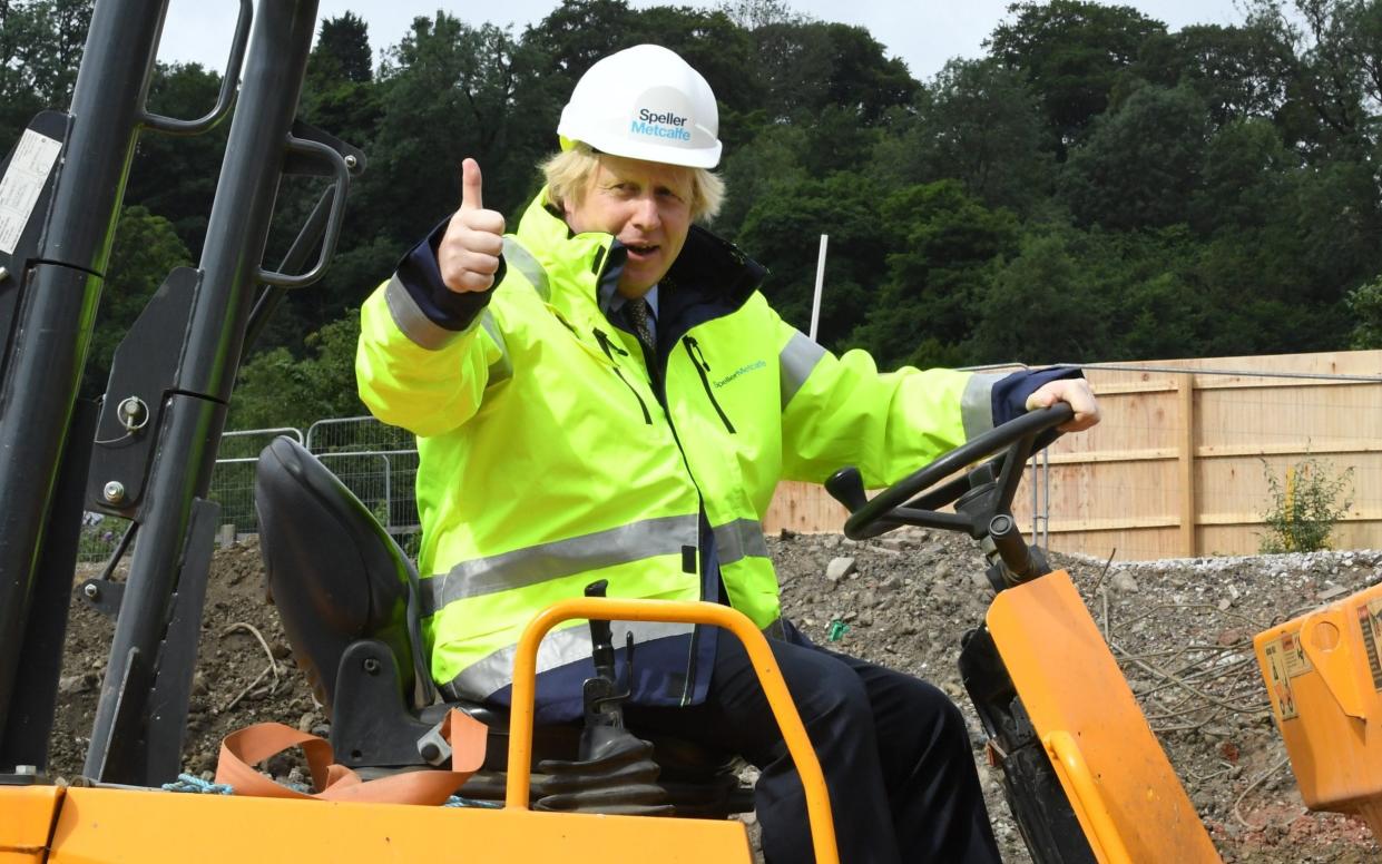 Boris Johnson during a visit to the Speller Metcalfe's building site at the The Dudley Institute of Technology in Dudley, central England - JEREMY SELWYN 