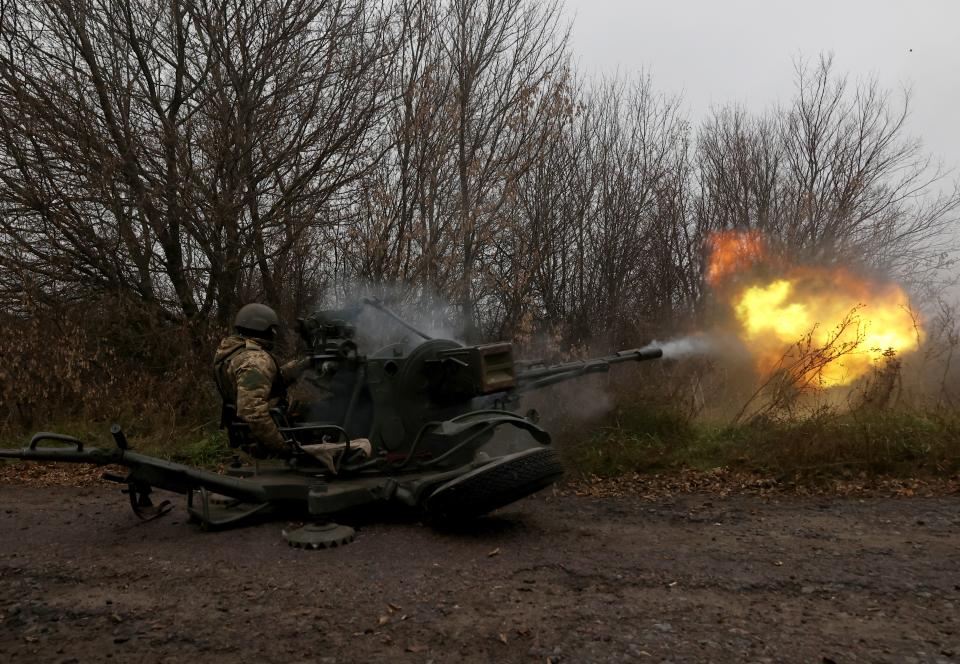 A Ukrainian serviceman fires a ZU-23-2 anti-aircraft automatic cannon at a frontline in the Kharkiv region on November 11, 2022, amid the Russian invasion of Ukraine. (Photo by STRINGER / AFP) (Photo by STRINGER/AFP via Getty Images)